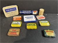 Eleven Antique tins