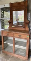 Antique cabinet with mirror