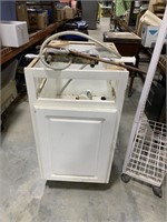 White cabinet with sink attachment missing drawer