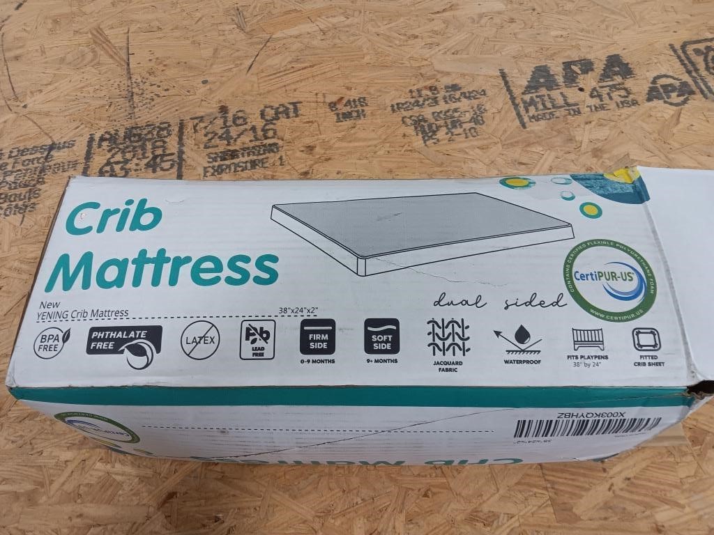 Crib mattress and cover, 38in x 24in x 2in