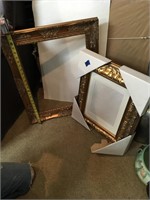(2) ornate picture frames large frame does not
