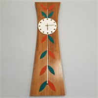 Mid-century modern wall clock on walnut board -