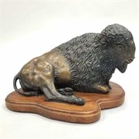 Stephen Leblanc bronze bison on swivel wooden