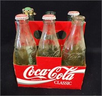 1994  Holiday Coke Bottles 8 oz - 6 pack
