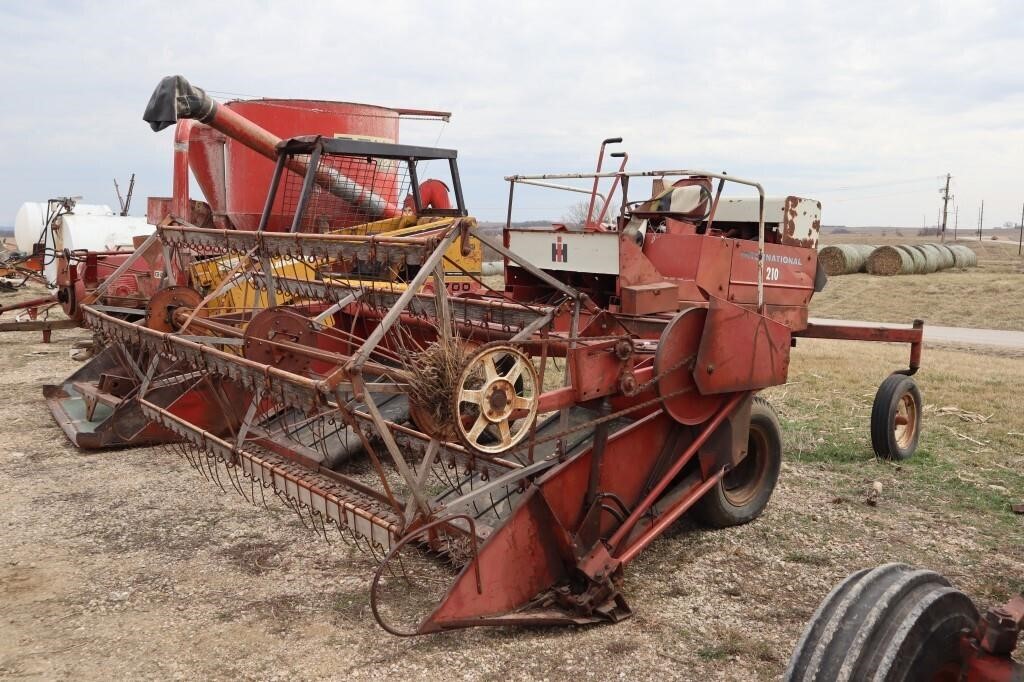 International 210 Swather