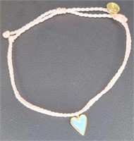 Boutique bracelet with heart pendant