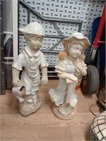 2 ceramic statues