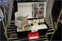 BOX AND BINDER OF SPORTS CARDS