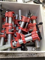 Box of short pipe clamps