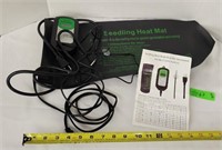 Seedling Heat Mat and Thermostat. Turns on.