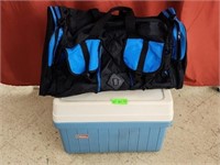 Coleman Cooler and black and blue Duffle Bag