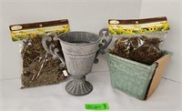 Ceramic flower pots and decorative green moss.