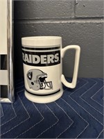 LOS ANGELES RAIDERS PICTURE ON BOARD AND MUG