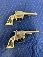 TWO HUBLEY WESTERN CAP GUNS