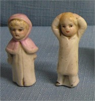 Pair of miniature porcelain dolls