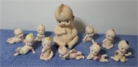 Handpainted ceramic babies. 6ins and 3ins