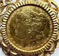 1887-O Morgan Dollar In Gold Plated Bezel