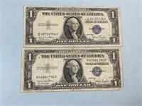 Two 1935D $1 silver certificates