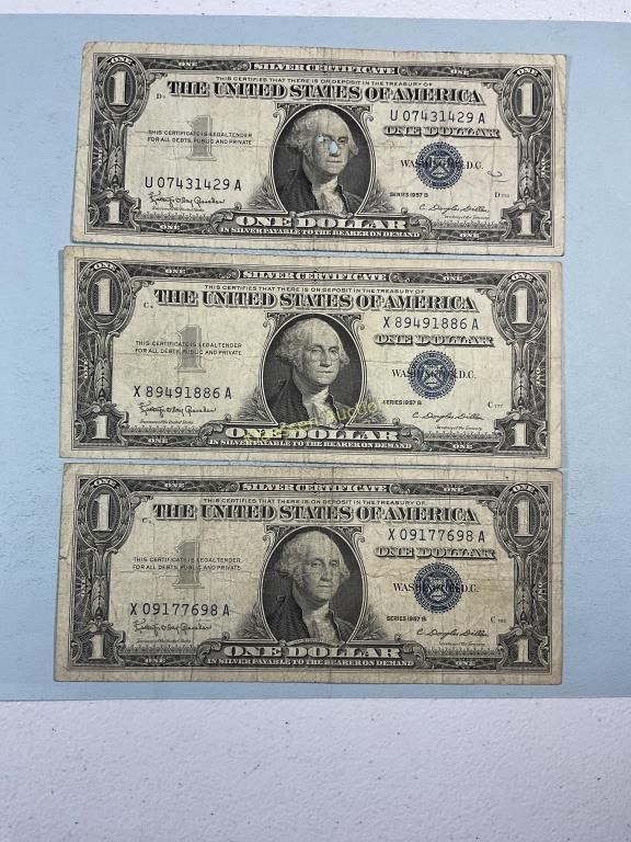 Three 1957B $1 silver certificates