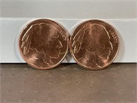 Two one ounce copper rounds