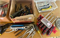 Assorted screwdrivers, pliers, hammers, etc.