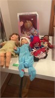 Sleepy eye dolls, kewpie doll, Raggedy Ann, some