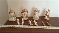 Small ceramic angels and shoes