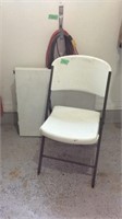 6 foot folding table and white folding chair