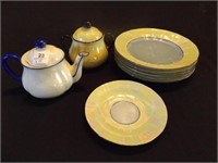 Iridescent 8 pcs, 5 plates some chipped, saucer,