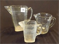 3 heavy glass pitchers, 4" - 7", chip on large one