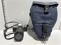 Cannon camera w/ blue case