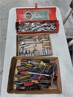 Red toolbox with large variety of wrenches,