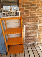 2 shelving units- orange is plastic 49" x 23"