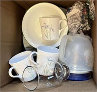 Assortment of dishes and Tupperware measuring bowl