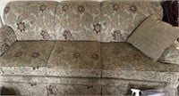Upholstered, floral couch