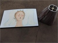 Angel painting on enamelware lid/top to some