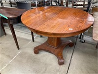 Round oak table with leaf