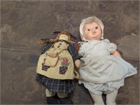 cloth doll and plastic doll