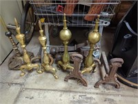 collection of cast iron andirons