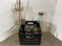 Black milk crate w/ jars & butter churn