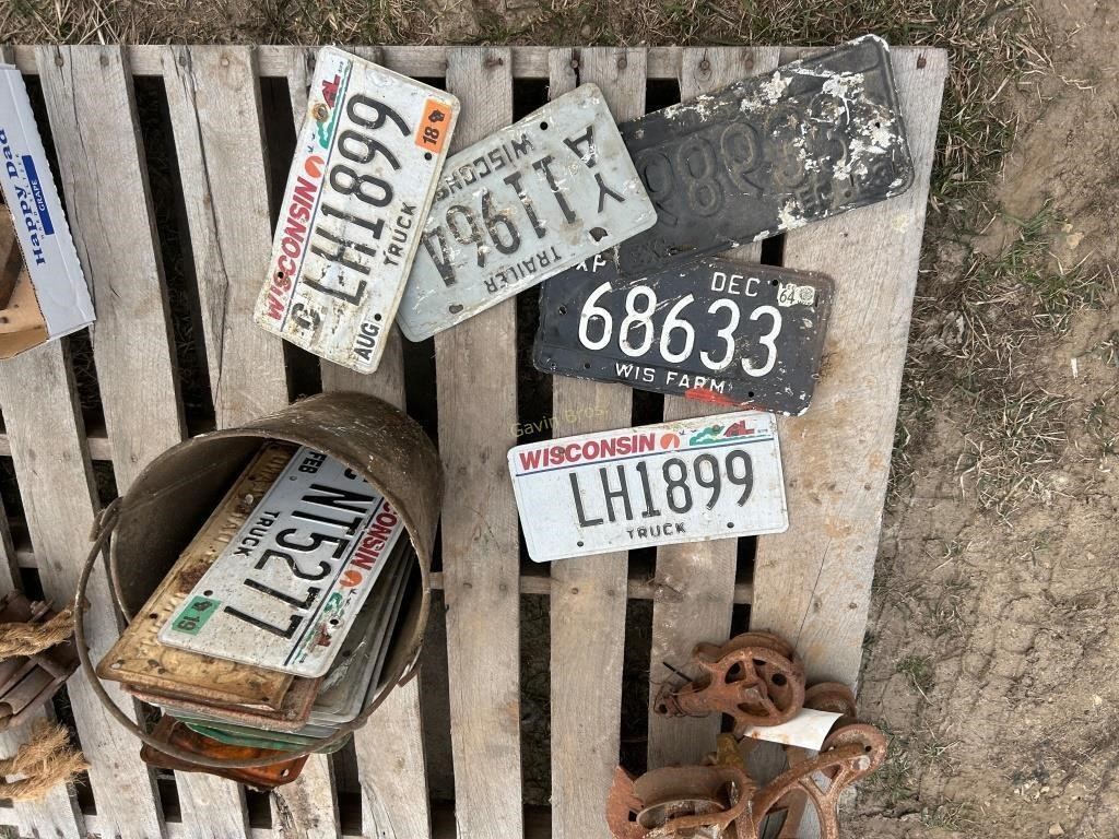 pail of license plates