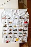Hanging Container of Ladies Earrings