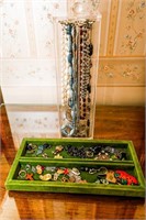 Necklaces in Container and Flat of Various Ladies