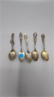 Set of five sterling stamped spoons