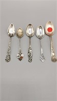 Set of four sterling stamped spoons plus one