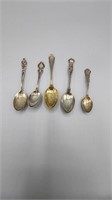 Collection of five stamped sterling spoons