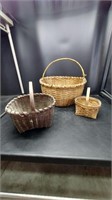 Collection of wicker handled baskets