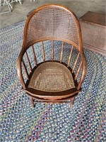 Cane back oak spring base rocker chair