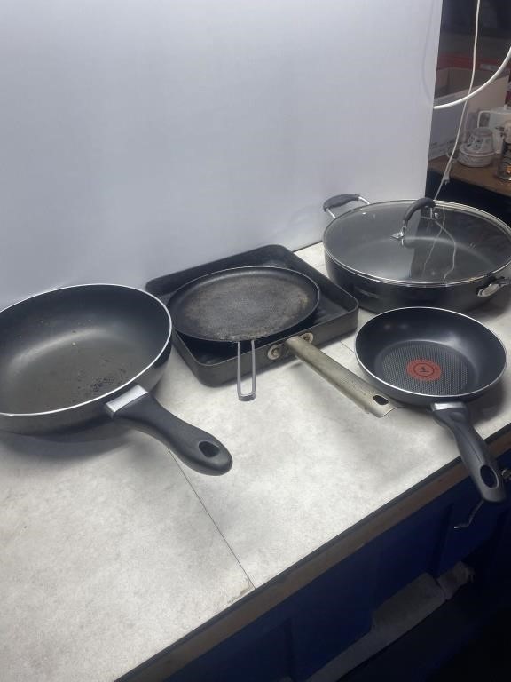 Several aluminum fry pans