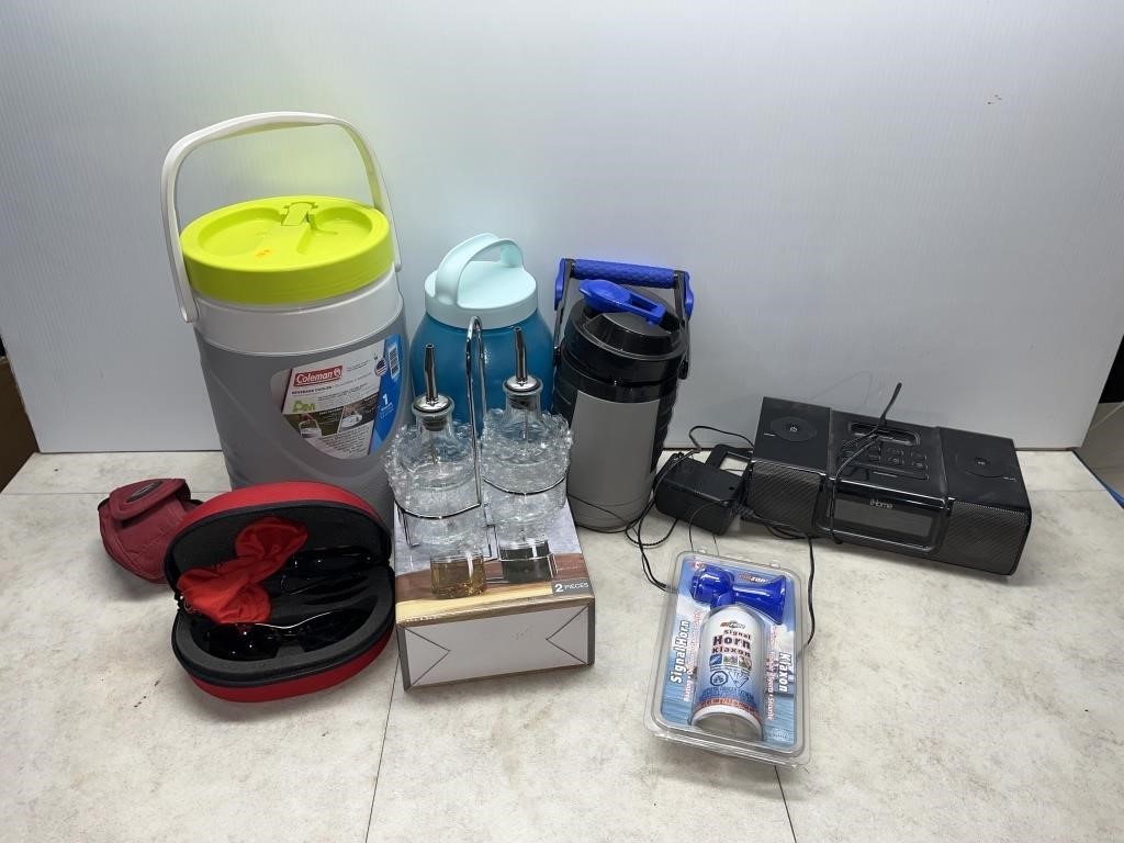 Water jugs, clock radio, oil & vinegar set,
